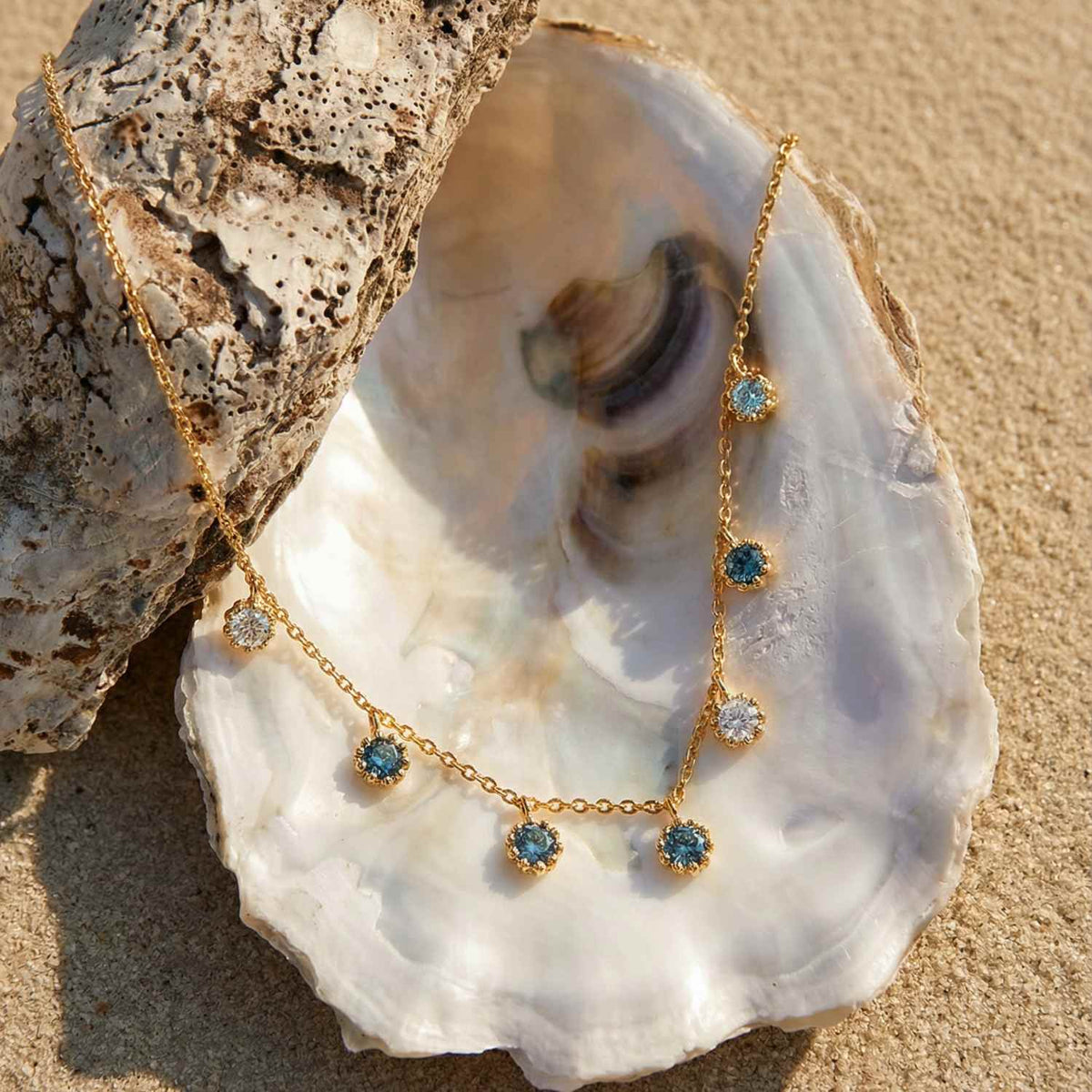 Dainty London Gold Aqua Necklace with Barnacle Details and Ocean Blue Topaz