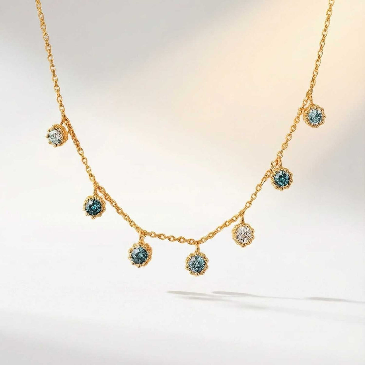 Dainty London Gold Aqua Necklace with Barnacle Details and Ocean Blue Topaz